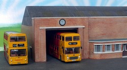 The garage in a simple diorama with more modern type buses - Click to enlarge